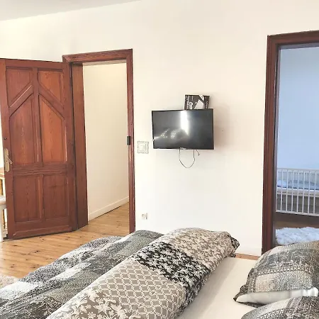 Maison De